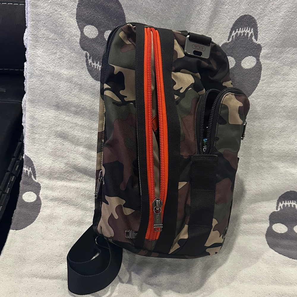 Tumi Camouflage Sling Bag with Orange Accents
